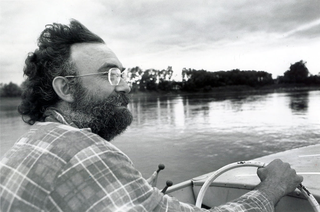 Doug Elley captains a motorboat